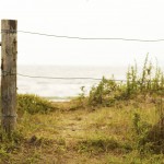 Wire Fence over path to the ocean