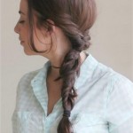 Woman with fishtail braid hairstyle